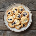 Blueberry Cheesecake Cookies with creamy centers and juicy blueberries