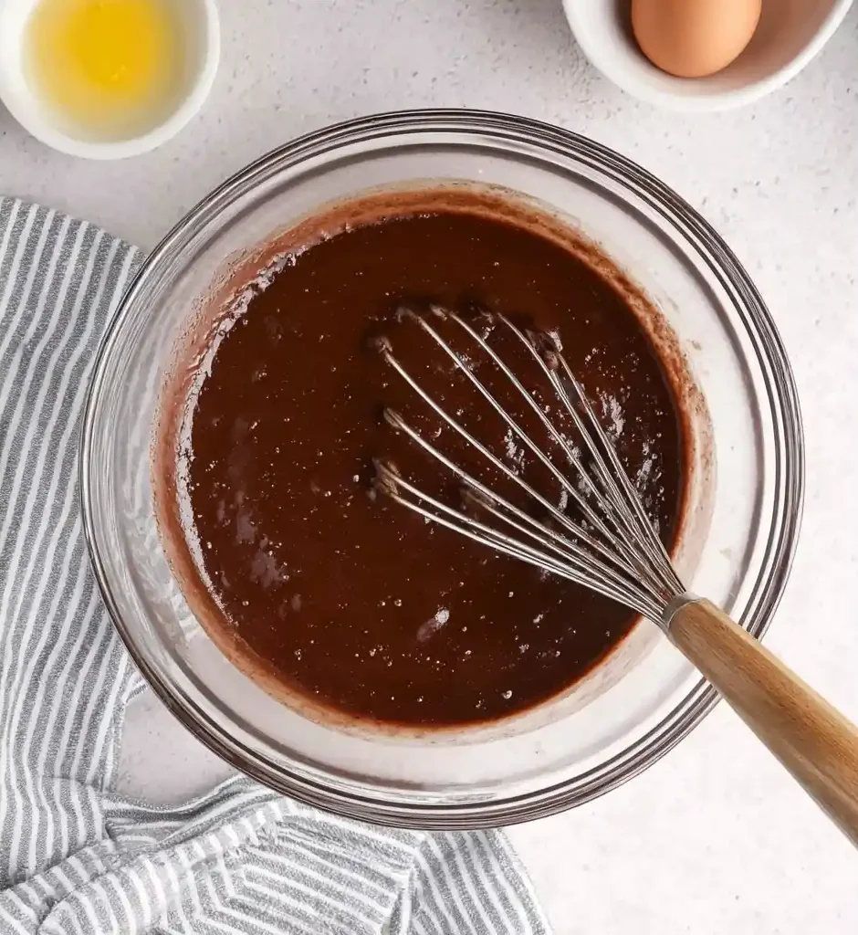 Chocolate raspberry cupcake batter being mixed