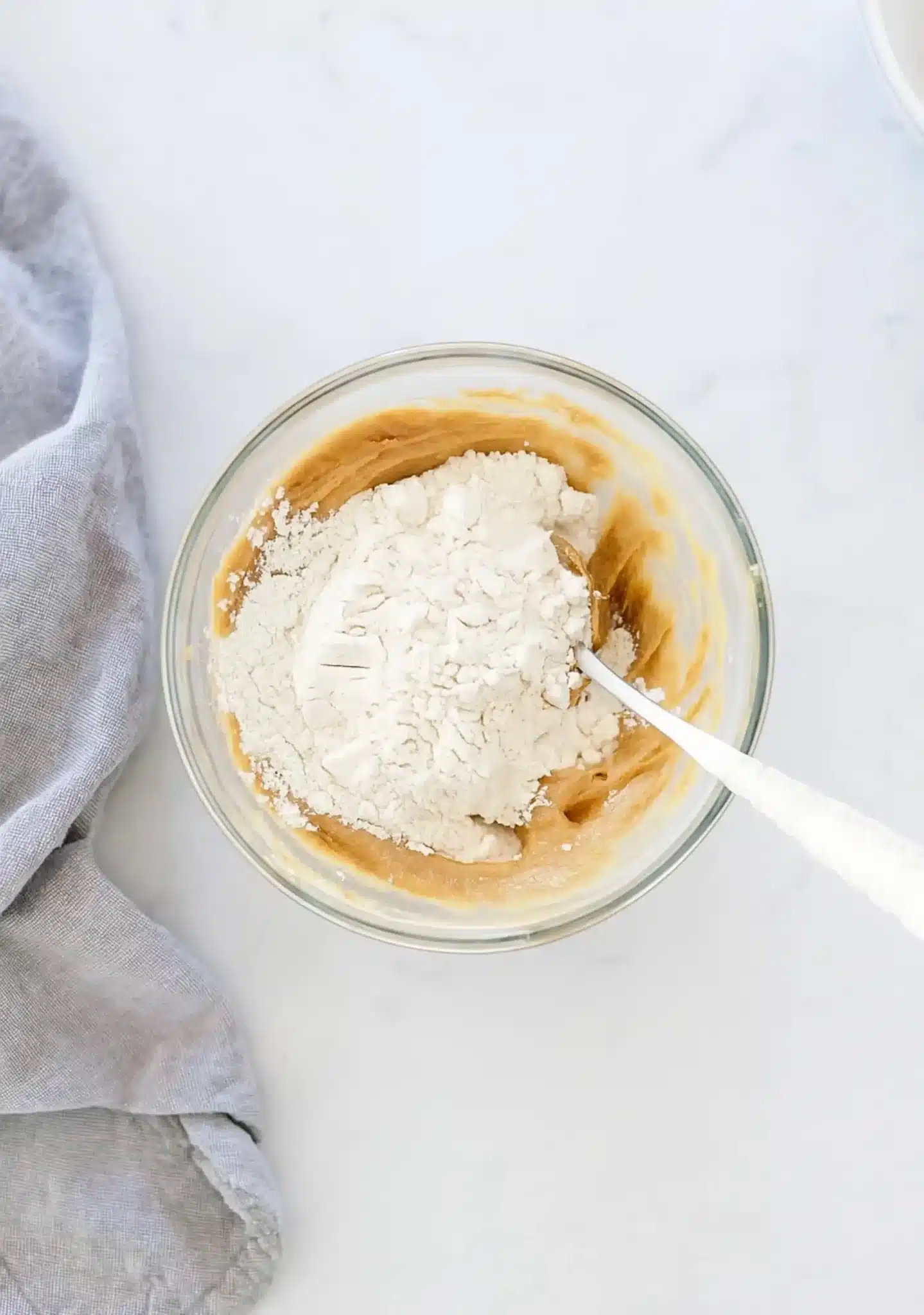 Mixing edible peanut butter cookie dough in a bowl